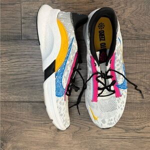 Nike White, Blue, Pink, and Yellow Athletic Shoes